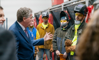 Gov McKee speaking to construction workers