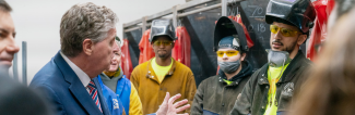 Governor meeting with welders